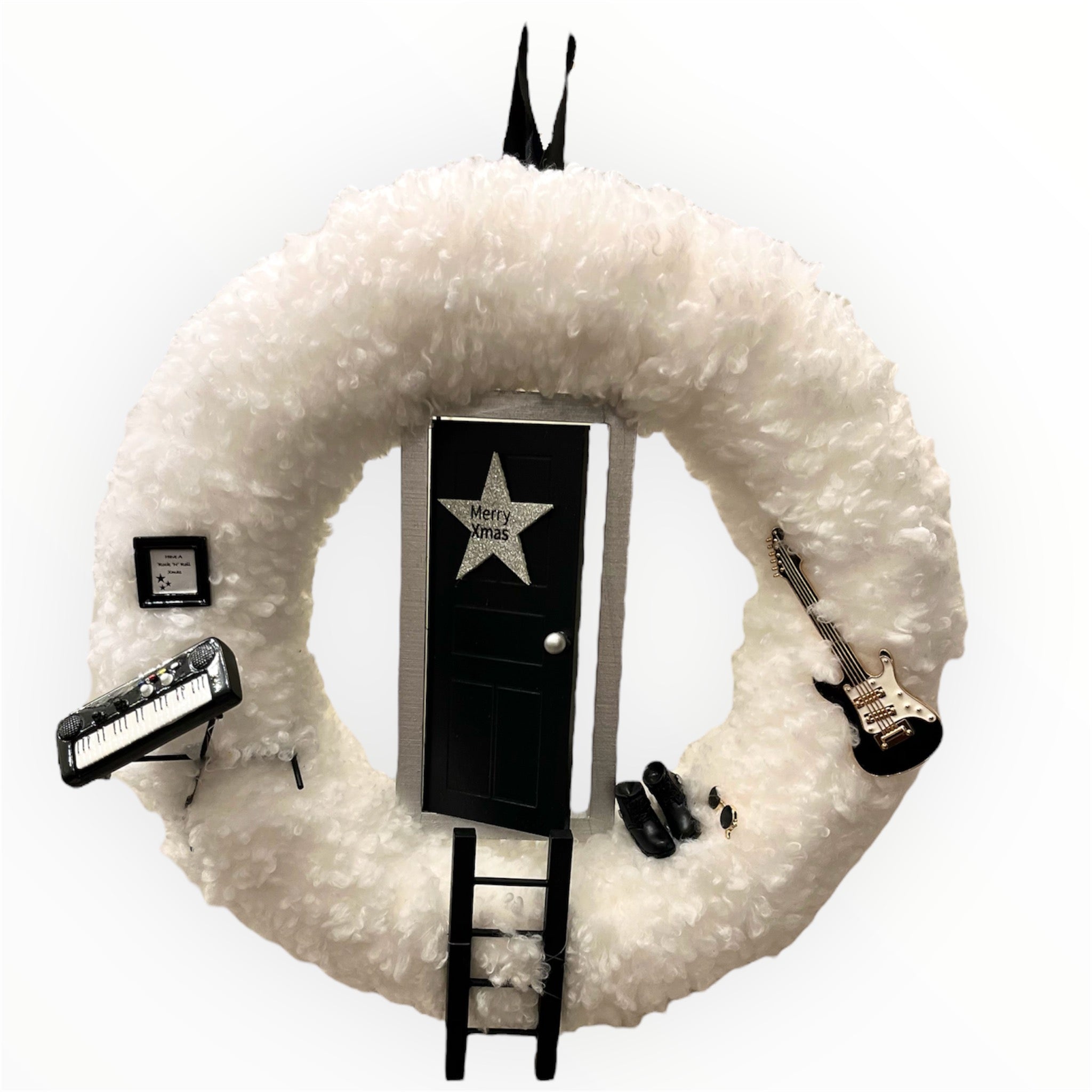 Julkrans med rockig nissedörr